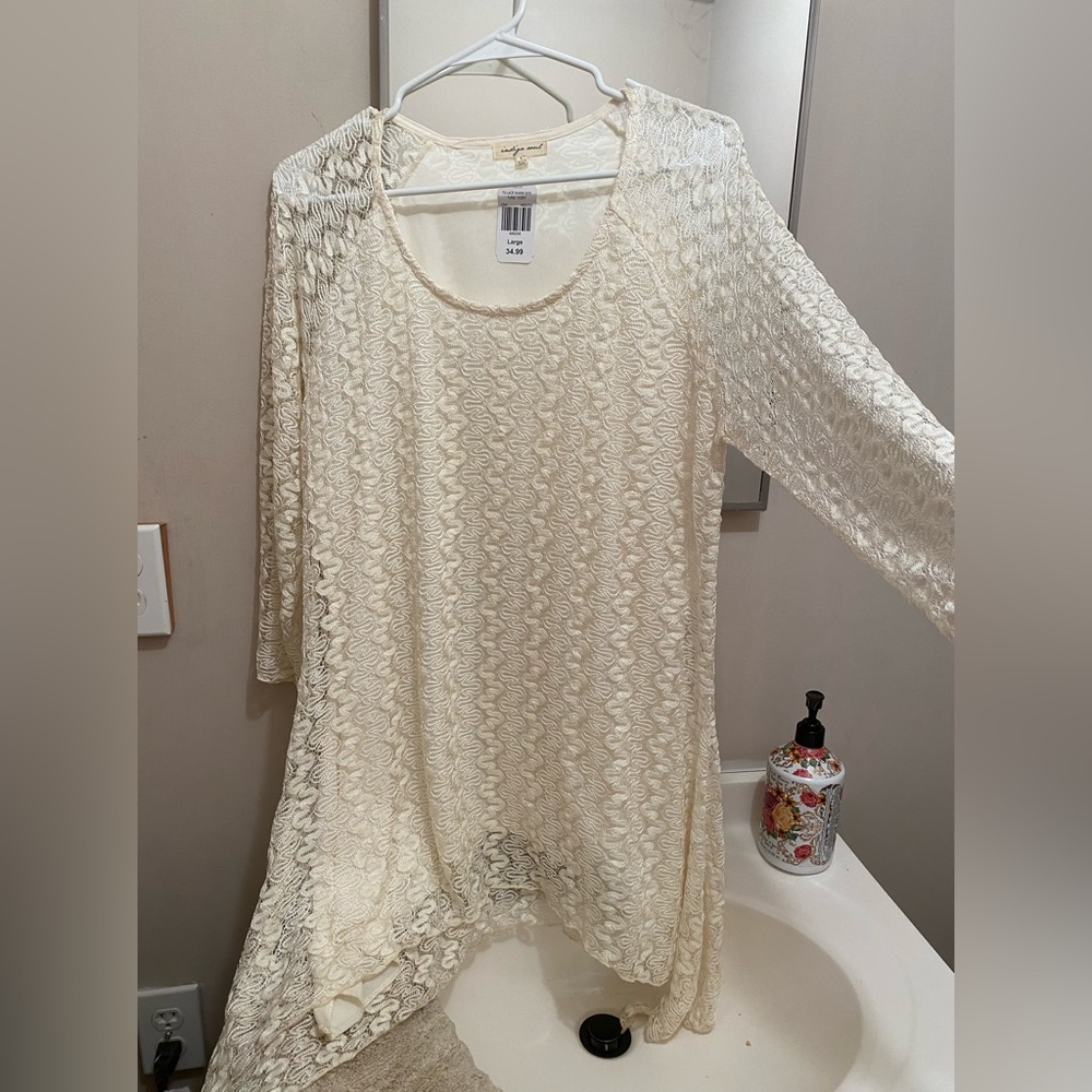 Ladies top with flared bottom